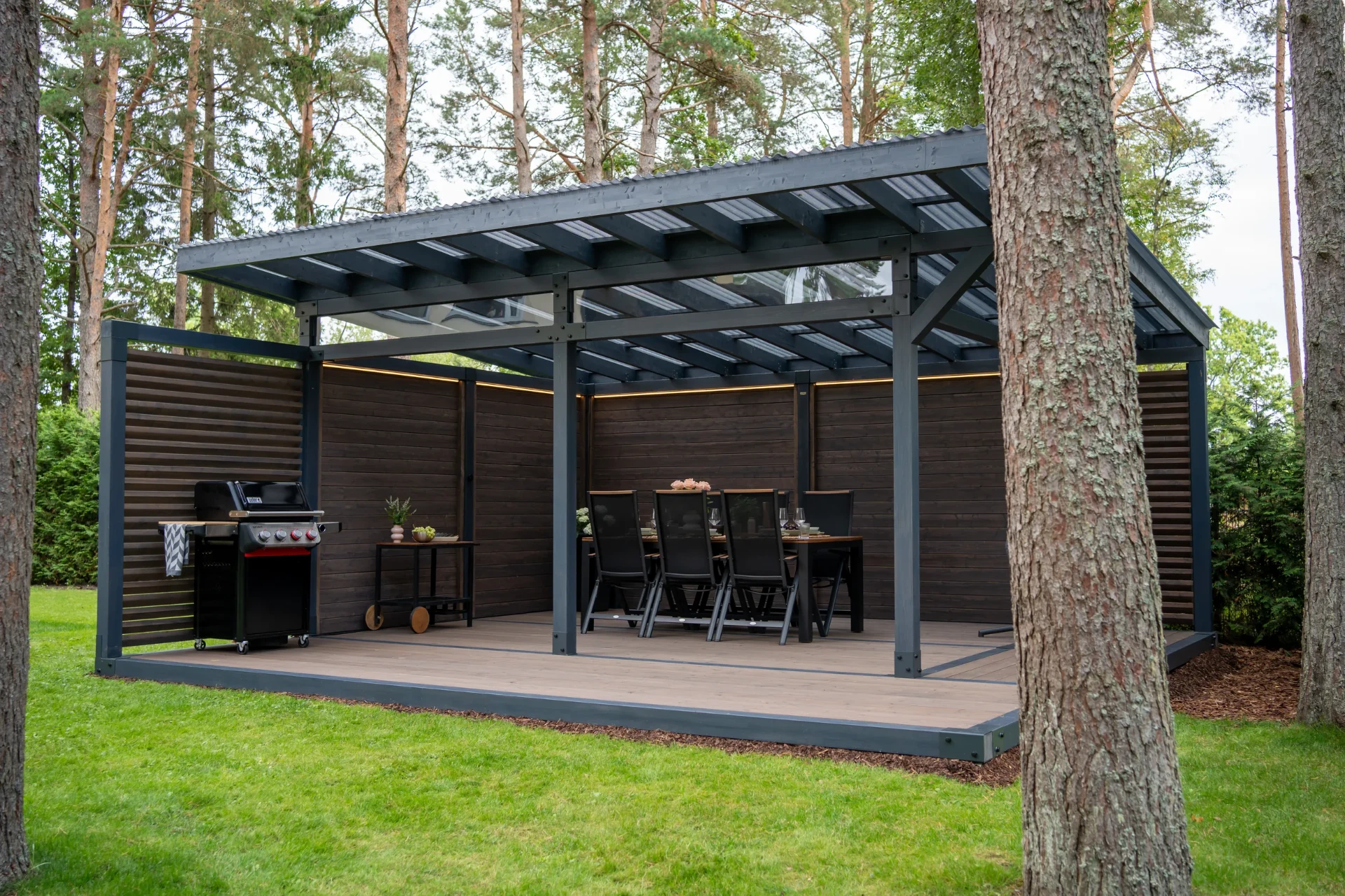 Fjordly Garden Room opening onto a Nordic landscape.